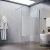 A modern bathroom with a walk-in shower, toilet, and bathrobe. Anteprima dell’immagine prodotto