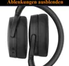 A close-up view of black headphones against a white background. Produktbild-Vorschau