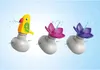 Three bath toys, one shaped like a parrot and two like flowers, are shown spraying water. Náhľad obrázku produktu