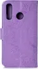 A close-up view of a purple flip phone case with a mandala embossed design. Produktbild-Vorschau