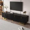 A modern living room with a black TV stand and a large TV mounted on the wall. Anteprima dell’immagine prodotto