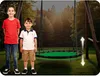Two young boys standing in front of a large, round nest swing in a grassy outdoor setting with trees in the background. Podgląd zdjęcia produktu