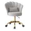 A light gray office chair with a scalloped back and a small pillow, on a gold base with wheels, isolated on a white background. Produktbild-Vorschau