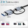 A close-up of a USB A and USB C adapter cable, with text and images illustrating its compatibility with various devices. Produktbild-Vorschau