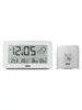 A digital alarm clock and a separate weather sensor are displayed on a white background. Produktbild-Vorschau