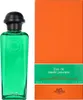 A bottle of Hermès Eau de Basilic Pourpre Eau de Cologne and its packaging are displayed against a white background. Náhled obrázku produktu