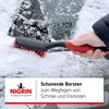 A hand is using a snow brush to clear snow from a car windshield. Anteprima dell’immagine prodotto