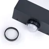 A close-up of a black sensor with a clear dome and a black ring on a white background. Produktbild-Vorschau