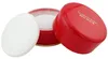 Elizabeth Arden Red Door Körperpuder in geöffneter roter Runddose mit goldener Aufschrift und weicher Applikatorquaste. Produktbild-Vorschau