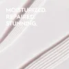 A close-up abstract view of a white, creamy substance with visible ridges, overlaid with text. Anteprima dell’immagine prodotto