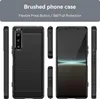 Collage of images showing a black phone case from different angles, with a smartphone inside one of the images. Text overlays describe the product's features. Podgląd zdjęcia produktu