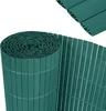 A rolled-up green privacy screen and a section of an unrolled screen. Náhled obrázku produktu