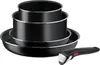 A set of black pots and pans with a detachable handle, neatly stacked against a white background. Anteprima dell’immagine prodotto