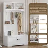 A white entryway organizer with shelves, hooks, and a bench, featuring decorative items and clothing. The image is split into sections highlighting storage for jewelry, clothing, and shoes. Anteprima dell’immagine prodotto