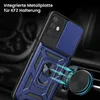 A blue and black phone case with a ring holder is shown attached to a car vent mount. Produktbild-Vorschau