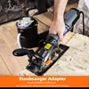A person is using a circular saw with a vacuum attachment to cut wood, with a vacuum cleaner in the background. Produktbild-Vorschau