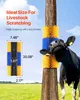 A cow scratching itself on a brush attached to a wooden pole in a grassy field. Anteprima dell’immagine prodotto