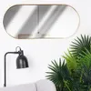 A mirror and a lamp are shown against a white wall. Produktbild-Vorschau