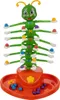 A green caterpillar-shaped toy with colorful balls on a red base. Náhľad obrázku produktu