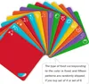 A fan of colorful cutting boards with food icons. Produktbild-Vorschau