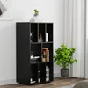A black shelving unit filled with various decorative items and books, placed next to a potted plant and a white curtain. Produktbild-Vorschau