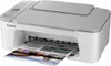 A white and gray Canon printer is shown from a slightly elevated front-left angle, with a printed document emerging from the output tray. Produktbild-Vorschau