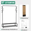 A product image showing a black metal clothing rack with a shoe rack, along with packaging and an instruction manual. Voir les images du produit