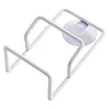 A white wire rack with a suction cup for holding a sponge. Produktbild-Vorschau