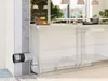 A cutaway illustration showing a ventilation system installation within a kitchen wall and cabinetry. Anteprima dell’immagine prodotto