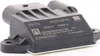 A black automotive electronic component on a white background. Podgląd zdjęcia produktu