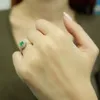 Halo Diamant Oval Smaragd Entourage Ring 14 Karat Weißgold Produktbild-Vorschau 1