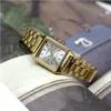 A close-up shot of a gold-colored Casio watch with a silver dial, resting on a textured surface. Produktbild-Vorschau