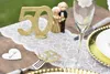 A table setting for a 50th anniversary celebration, with decorations and place settings. Produktbild-Vorschau