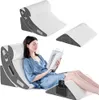 A woman is reading a book while using a set of orthopedic wedge pillows for support. Anteprima dell’immagine prodotto