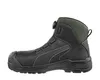 A black Puma safety boot with green accents is shown against a white background. Produktbild-Vorschau
