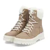 A pair of beige winter boots with white fur lining and white laces, presented on a white background. Voir les images du produit