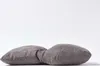 Two gray pillows are placed side-by-side on a white background. Náhled obrázku produktu