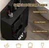 A black wooden bathroom cabinet with drawers and a door, shown with some products on top and inside. Text overlays highlight features. Náhled obrázku produktu