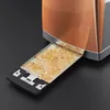 Close-up of a toaster crumb tray filled with crumbs. Produktbild-Vorschau