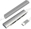 A close-up studio shot of a USB C hub and a USB C cable against a white background. Produktbild-Vorschau