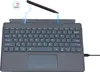 A gray keyboard with a stylus magnetically attached to the top. Náhľad obrázku produktu