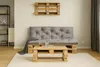 A living room scene with a sofa and coffee table made from wooden pallets. Produktbild-Vorschau