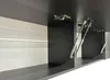 Close-up view of the interior of a cabinet, showing gas struts and hinges. Produktbild-Vorschau