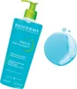 A bottle of Bioderma Sébium Purifying Cleansing Foaming Gel and a swatch of the product with foam. Podgląd zdjęcia produktu