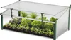 A small greenhouse filled with young plants. Anteprima dell’immagine prodotto