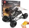 A remote-controlled desert racing buggy toy set, with the box in the background and a smartphone being used to control it. Náhľad obrázku produktu