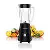 A black VERTENZ stand mixer is shown in the center, surrounded by various fruits like bananas, oranges, kiwis, lemons, and limes, suggesting its use for making smoothies and juices. Podgląd zdjęcia produktu