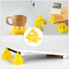 Collage showing yellow pyramid stands used for painting projects, holding a wooden cup, and supporting a wooden board. Produktbild-Vorschau