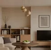 A modern living room with a wooden bookshelf, a sofa, a coffee table with fruit, and a TV. Produktbild-Vorschau