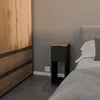A bedroom scene with a nightstand next to a bed and a wardrobe. Podgląd zdjęcia produktu